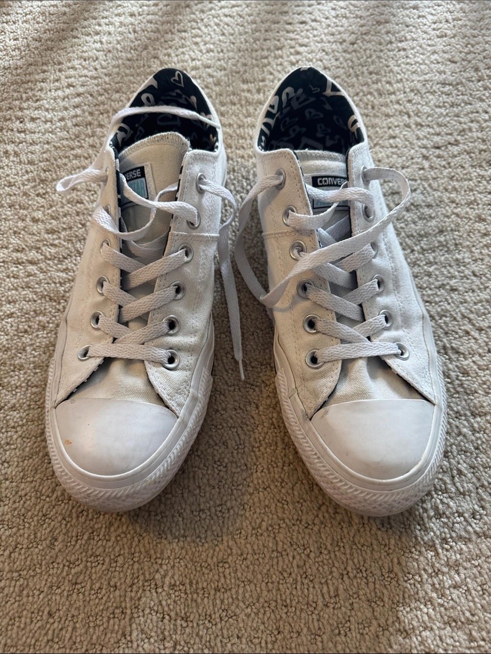 Converse White Low-Top Canvas Sneakers with Black Heart Lining